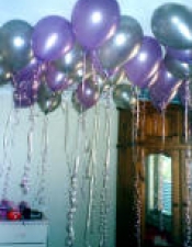 Lavender and silver flaoting balloons